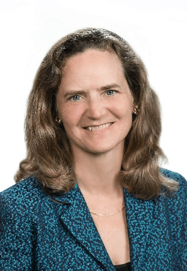 brunette woman wearing blue blazer